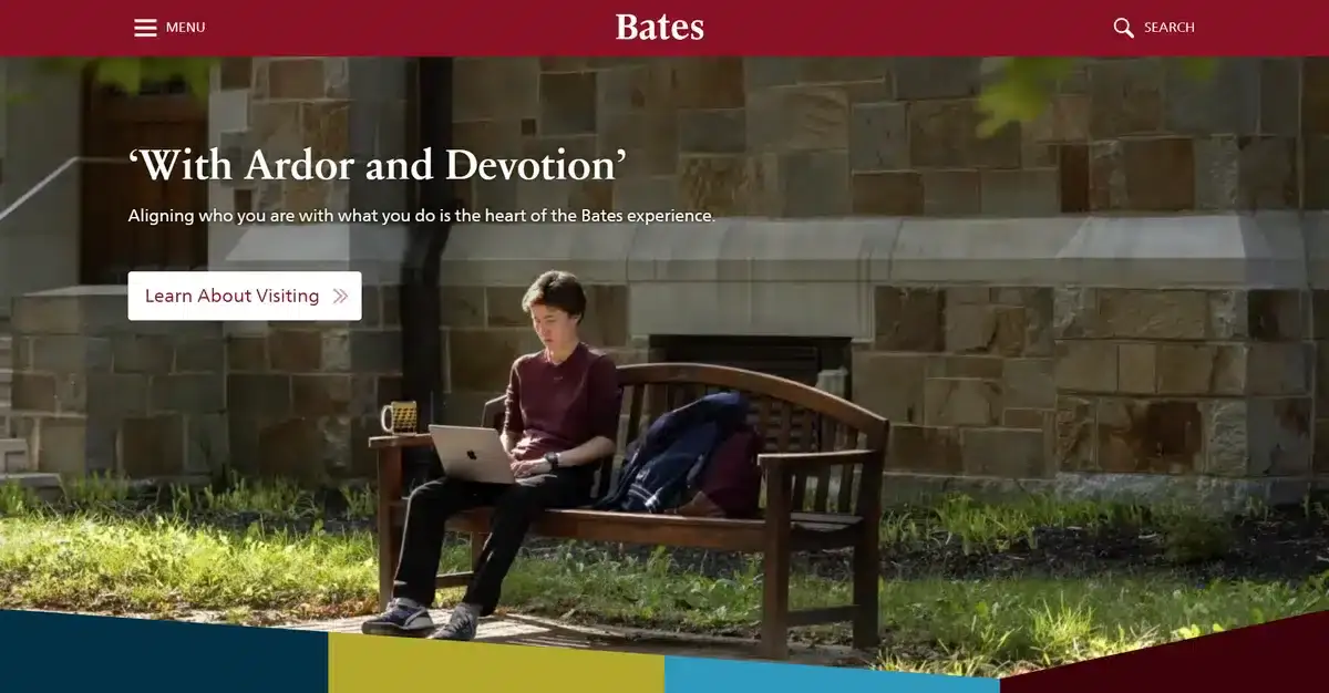 Bates college's website showing a student working at a bench on campus