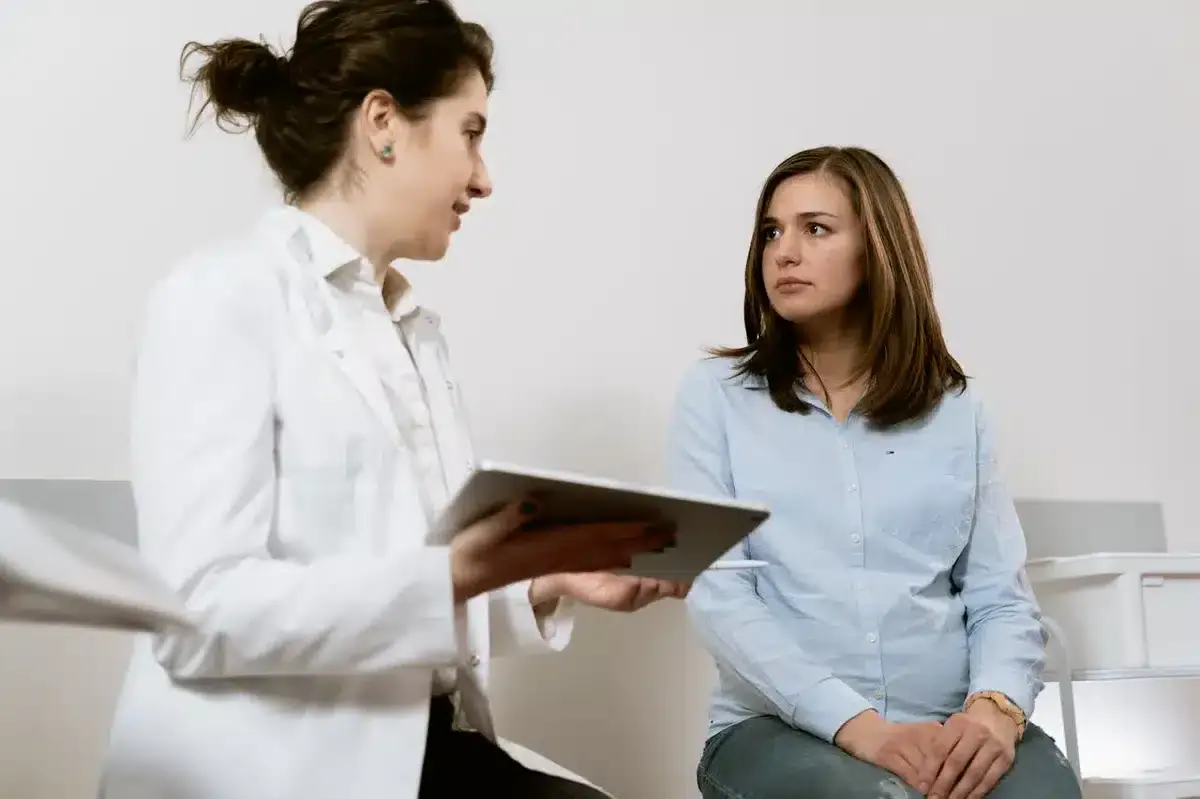 Doctor talking to a patient in a hospital