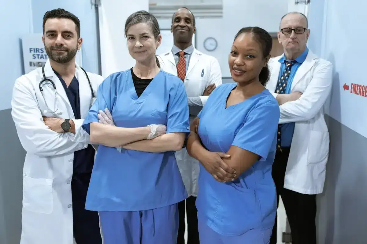 Group of doctors and nurses posing for a photo