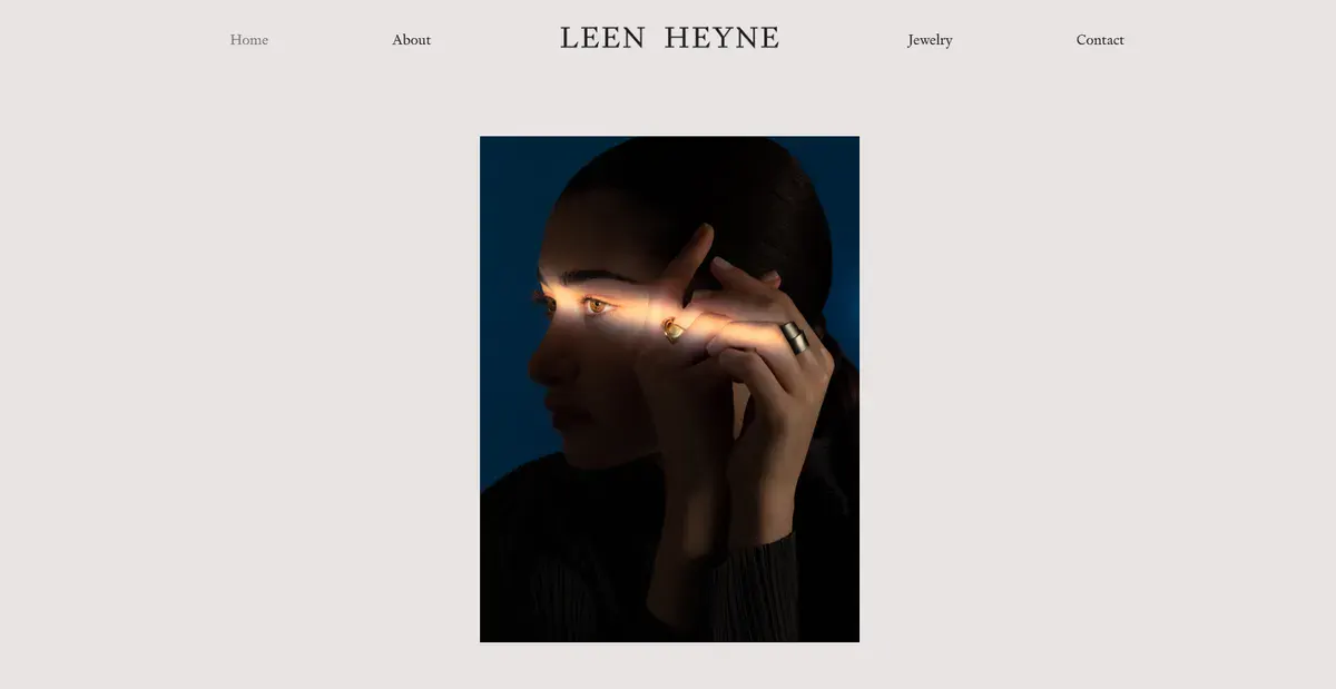 Leen Heyne's business website with the founder using jewelry made by the brand