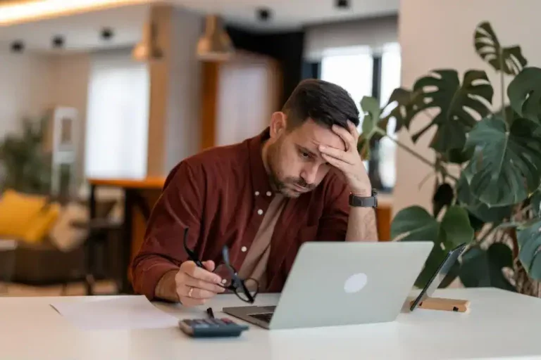Man looking at the website redesign signs