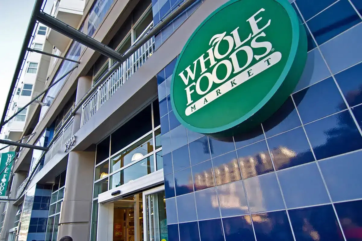 Whole Foods Market Logo on a blue building