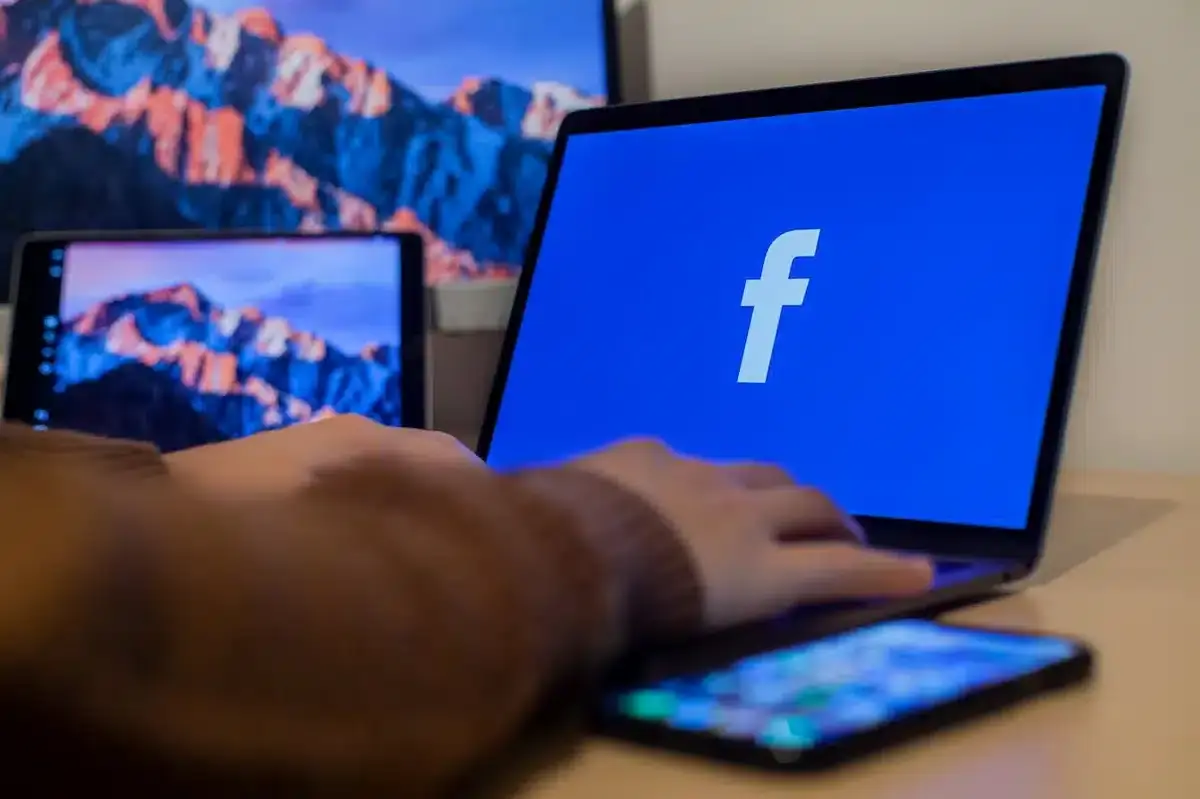 Facebook's Blue logo on a laptop screen