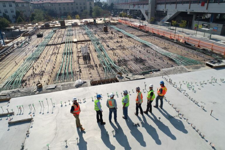 real estate construction site workers depicting construction industry