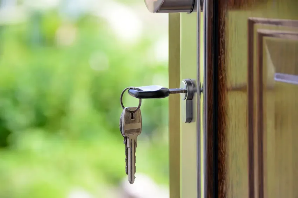Close up of a key inside the door of a house