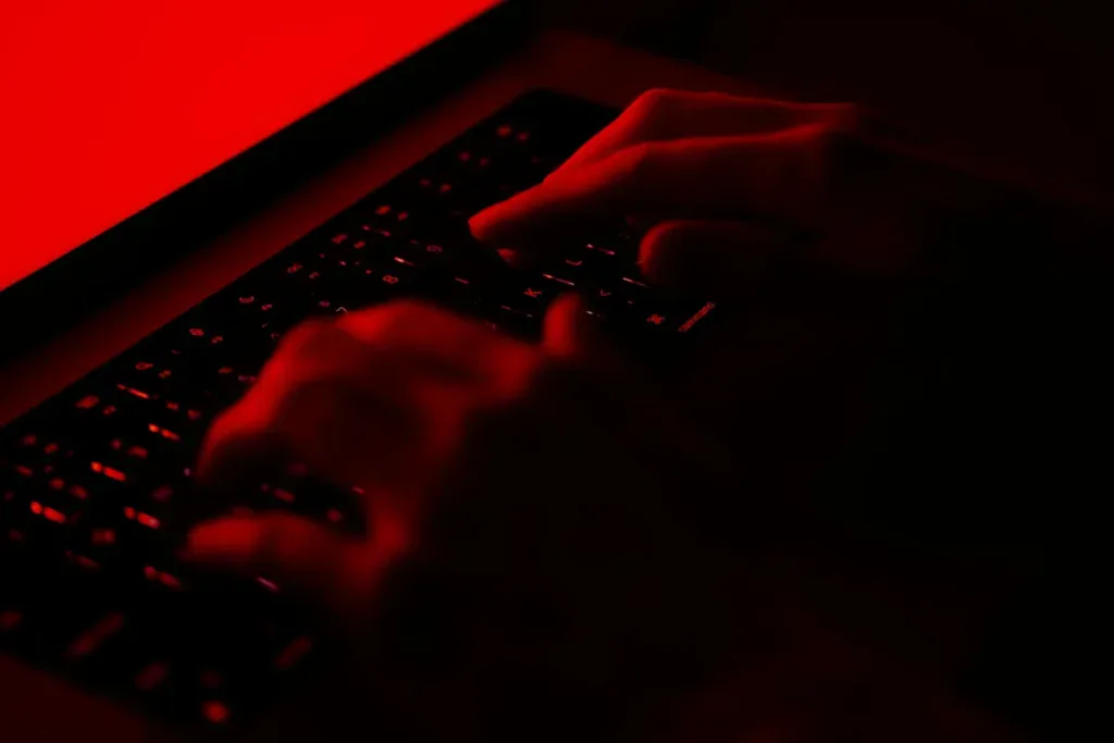 cyberattacker using laptop