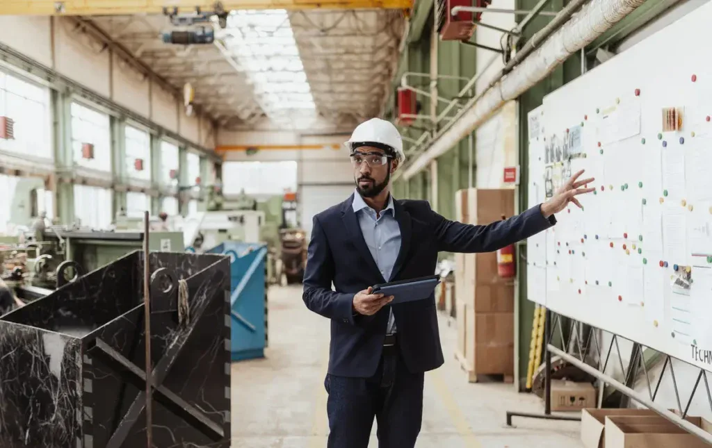 Manager leading manufacturing process
